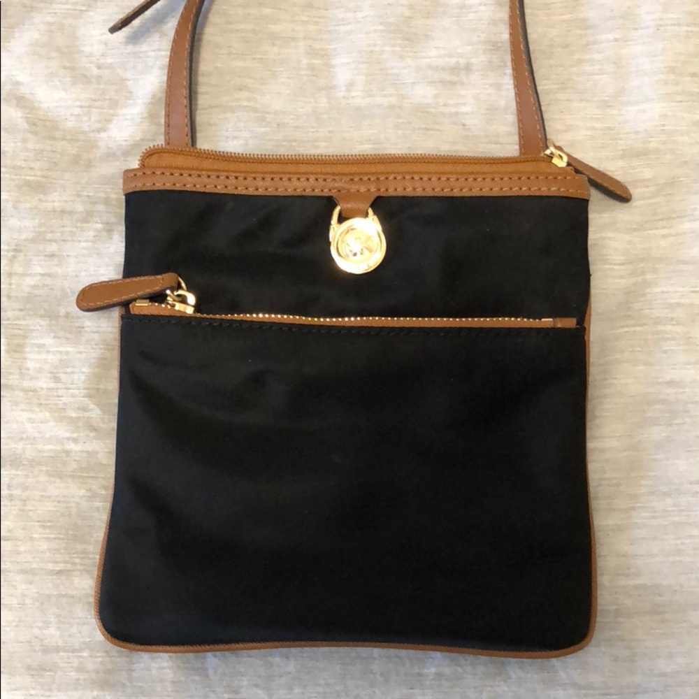 Black Michael Kors Kempton Nylon Crossbody purse.